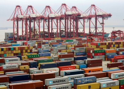 FILE PHOTO: Containers are seen at the Yangshan Deep Water Port in Shanghai
